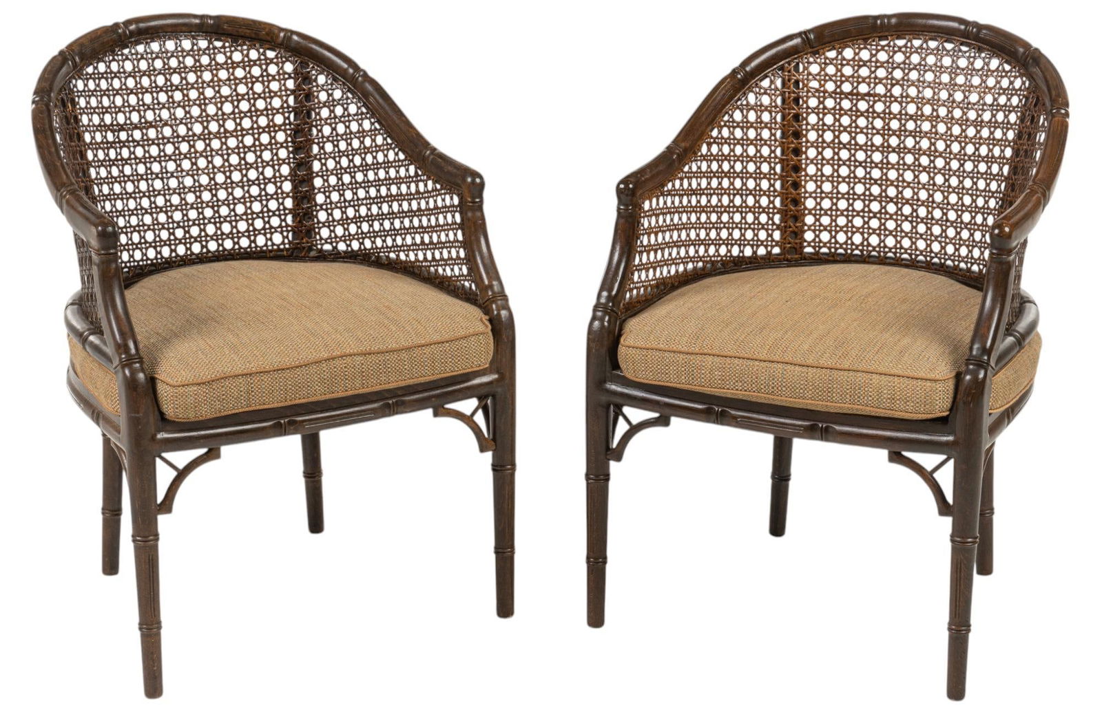 Pair of Bergere Chairs: Pair of faux bamboo and cane Berere armchairs, with tan cushioned seat height 33 in. x width 24 in. x depth 25 in.