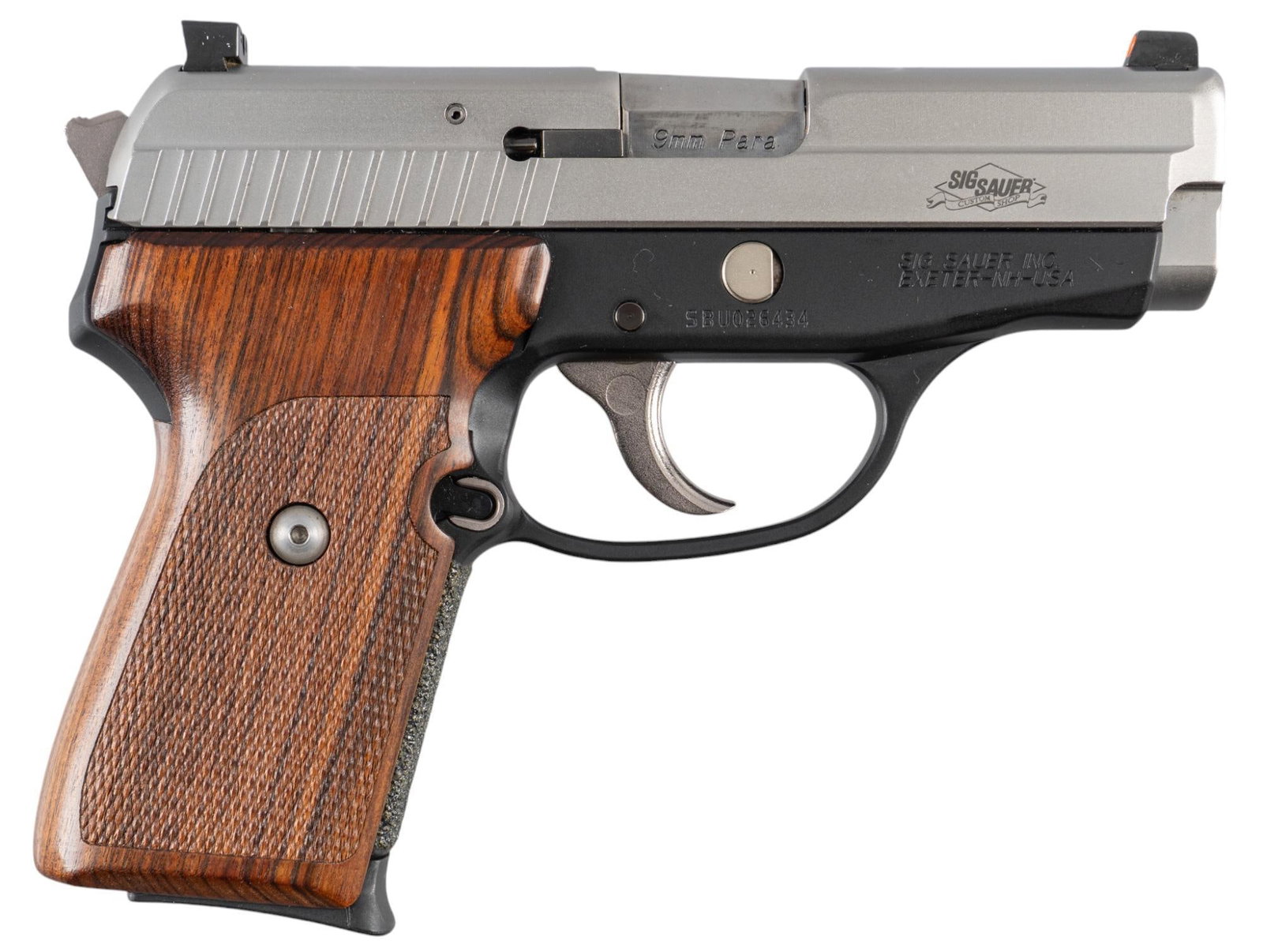 Sig Sauer Custom Shop P239 SAS 9mm Semi Auto Pistol: Serial: SBU026434 Manufacturer: Sig Sauer Inc. Model: P239 Caliber: 9mm Barrel length: 3.6 in. OAL: 7 in. Condition: Excellent - Very Good; wood grips have near no handling marks; slide & frame ha
