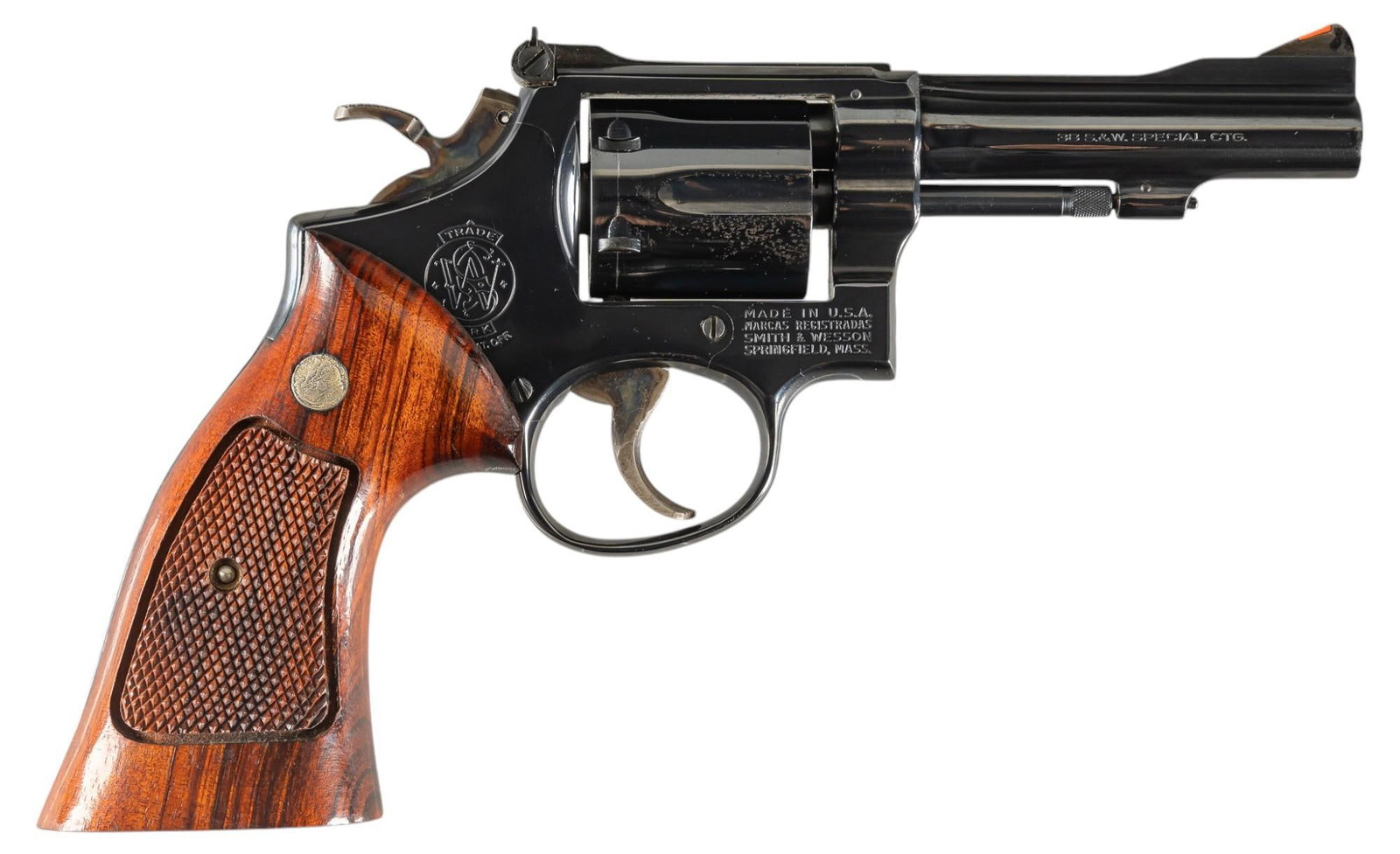 Smith & Wesson Model 15-3 38 Spl Revolver: Serial: 8K24623 Manufacturer: Smith & Wesson Model: 15-3 Caliber: 38 Spl Barrel length: 4 in. OAL: 10 in. Condition: Very Good; wood grips have light handling marks; barrel, frame & cylinder h