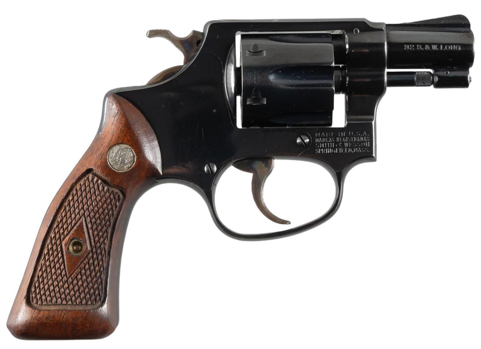 Smith & Wesson Model 31 32 S&W Long Revolver: Serial: 681893 Manufacturer: Smith & Wesson Model: 31 (flat latch) Caliber: 32 S&W Long Barrel length: 2 in. OAL: 6.5 in. Condition: Very good; grips have very light wear & handling marks 