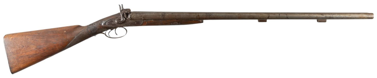 W. Greener SXS 10 GA Percussion Shotgun: Serial: 10274 Manufacturer: W. Greener Model: SXS Percussion Caliber: approx. 10ga Barrel length: 32 in. OAL: 48.5 in. Condition: Poor-Fair; stock has heavy wear & handling marks with deep gouges,