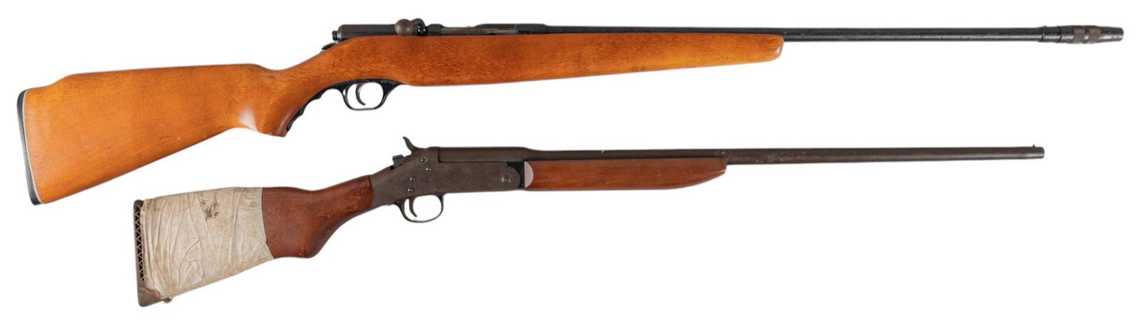 Pair of 410 Bore Shotguns: Serial: (1) NSN; (2) AX451365 Manufacturer: (1) O.F. Mossberg & Sons inc.; (2) Harrington & Richardson, Inc. Model: (1) 183KC; (2) Topper 88 Caliber: 410 Bore Barrel length: (1) 25 in. (includ