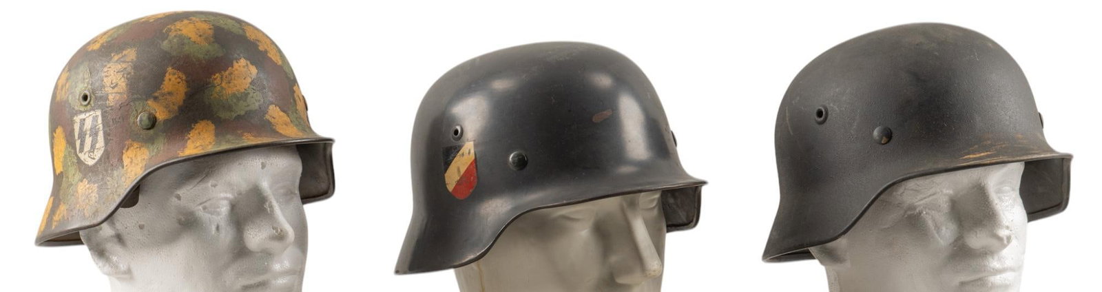 Collection of 3 WWII German Helmets: Includes: -WWII M40 German helmet: faux decals & paint; liner & chinstrap; helmet marked "831" & "ET62"; helmet stamped "1940"; liner marked "54"; (11 in. x