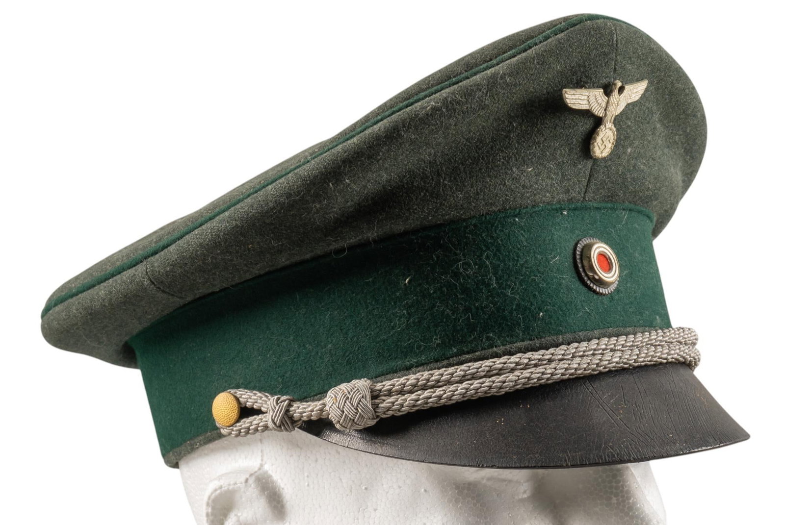 WWII German Forestry Officer's Visor Cap: WWII German Forestry Officer's Visor cap: marked "W. Michovius / Cottbus / EREL / Sonderklasse"; nice condition; missing wreath; (10 in. x 10 in. x 6 in.) Provenance: A San Antonio, Texas 