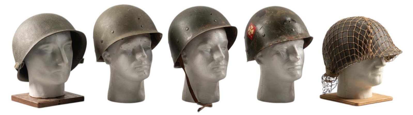 Collection of 3 WWII US M1 Helmets: Includes: -WWII US M1 helmet: inner & outer shells; liner & chinstrap; (11 in. x 10 in. x 7 in.) -WWII US M1 helmet: inner & outer shells; netting & chinstrap are incorrect; (11 in. x 