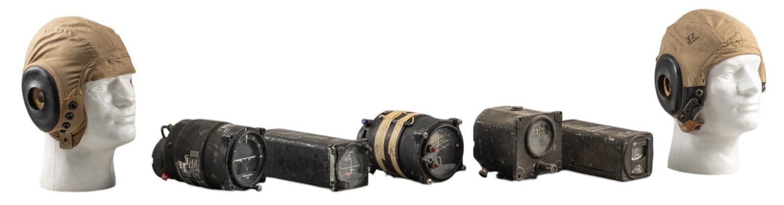 Pair of WWII US Army Air Forces Caps and 23 Aircraft Instruments: Includes: 23 vintage aircraft instruments & 2 WWII pilot caps -pictorial horizons, pictorial devisation indicators, aeronautical converter/indicators, horizon gyroscopes, directional gyro indicators, 