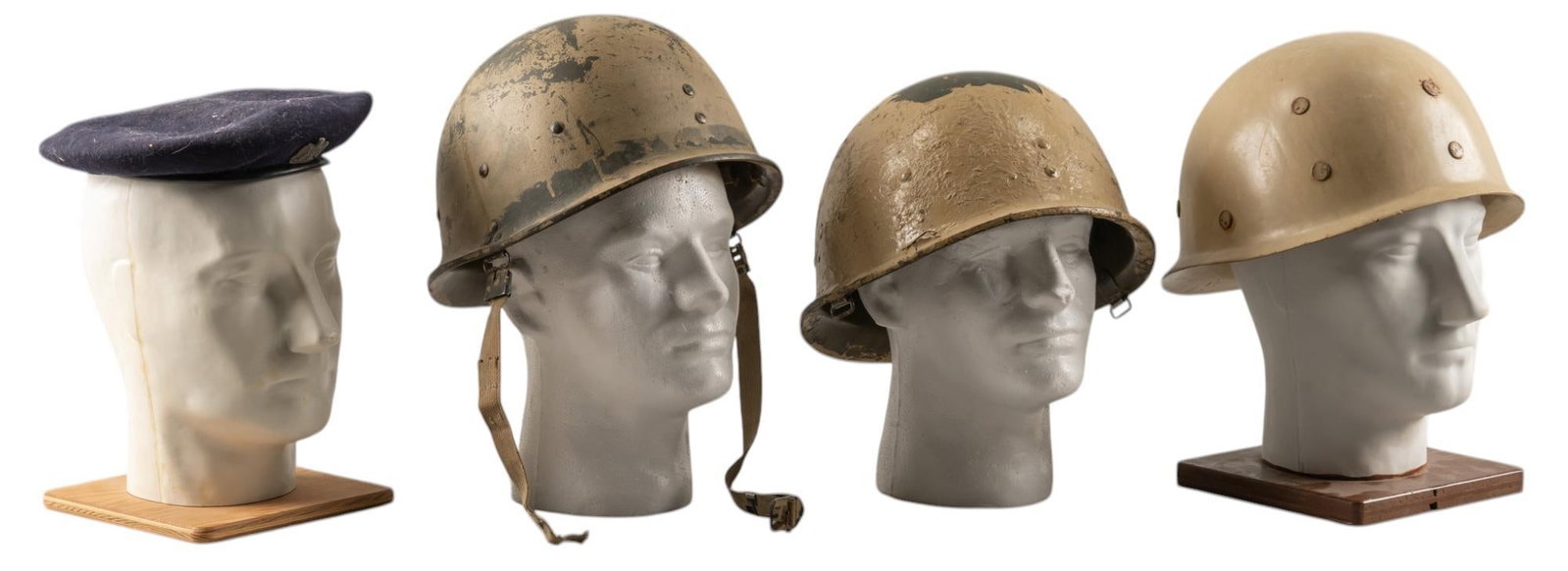 Group of Iraqi Desert Storm Era Helmets & Beret: Includes: -Iraqi Army Beret (black); moderate wear; (9.5 in. diameter) -Iraqi M80 helmet (tan); liner & chinstrap; marked on inside; moderate wear; (11 in. x 10 in. x 7 in.) -Iraqi M80 helmet (tan