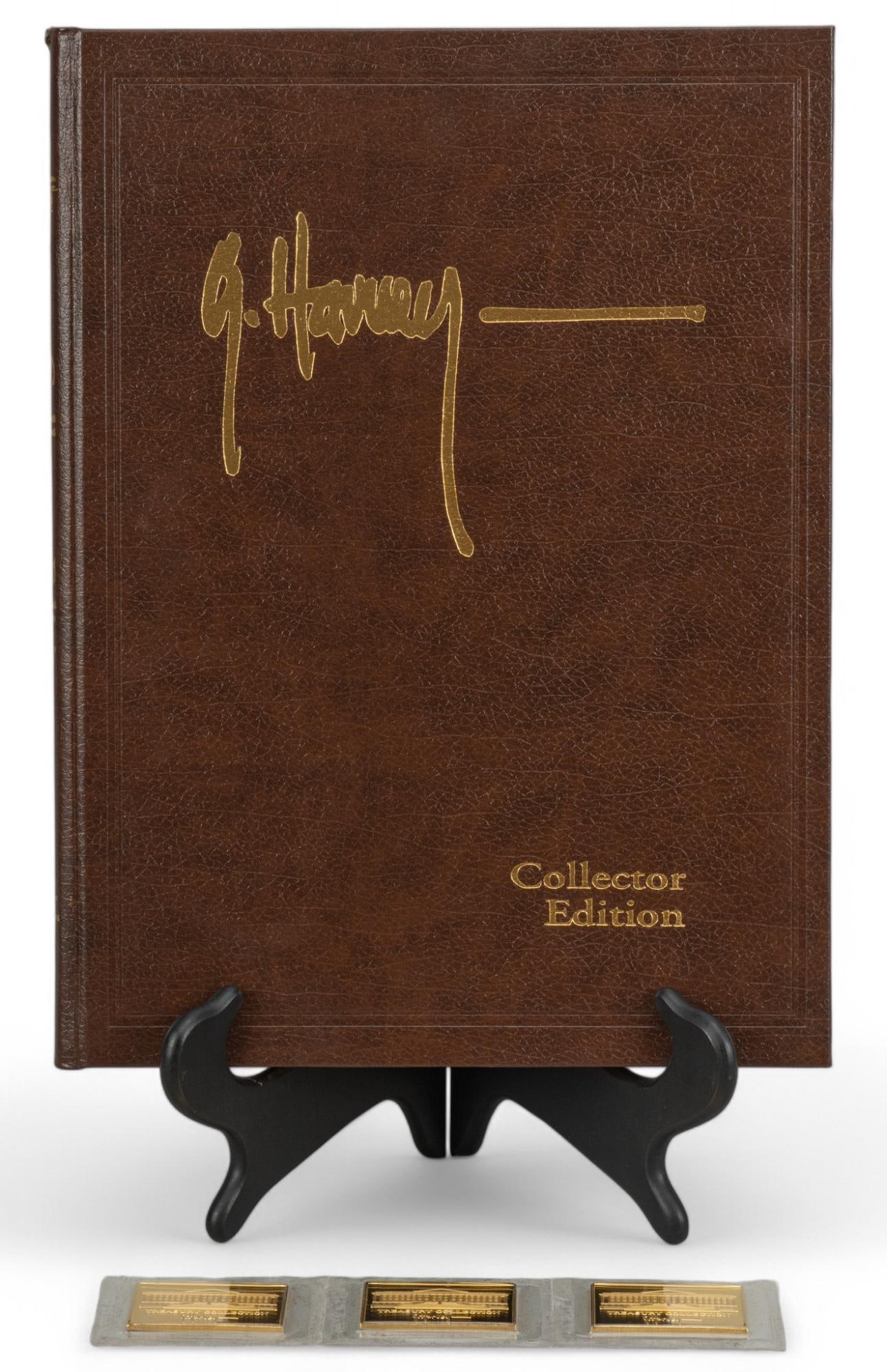 Signed G. Harvey "The City Series" Collector Edition Book: Signed Gerald Harvey Jones Collector Edition "The City Series leather-bound book and loose gold-tone metal plaques height 14.5 in. x width 11 in. x depth 1 in. Provenance: Property from the collec