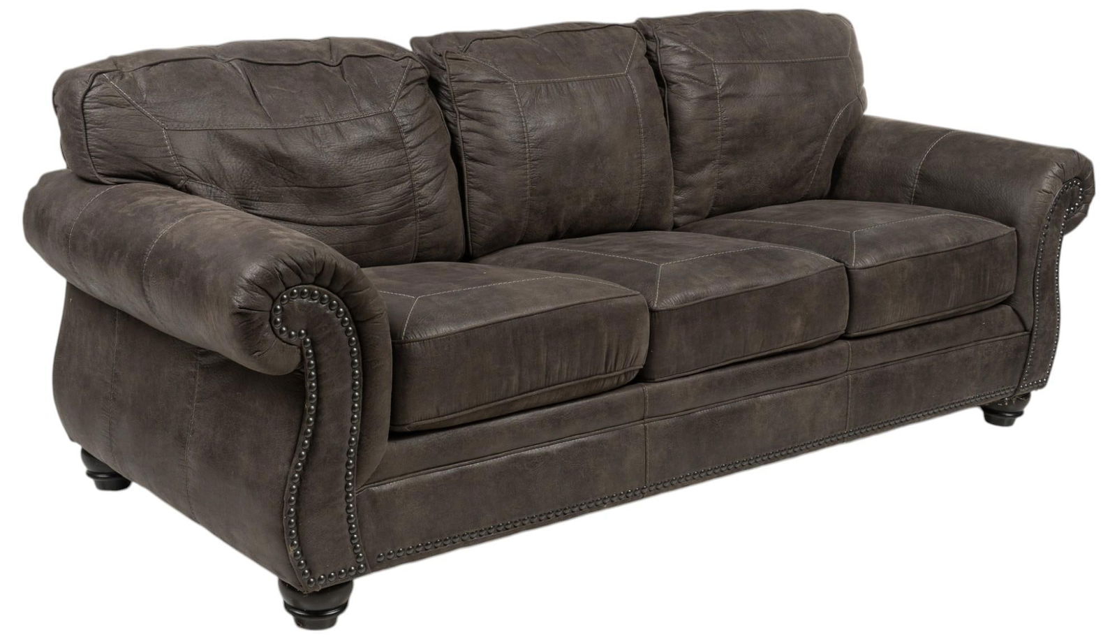 Leather Sofa: Sofa featuring dark gray softened leather upholstery, with metal rivet trim, supported on wooden feet height 36 in. x width 89 in. x depth 38 in. Provenance: The Estate of Urban "Obie" O