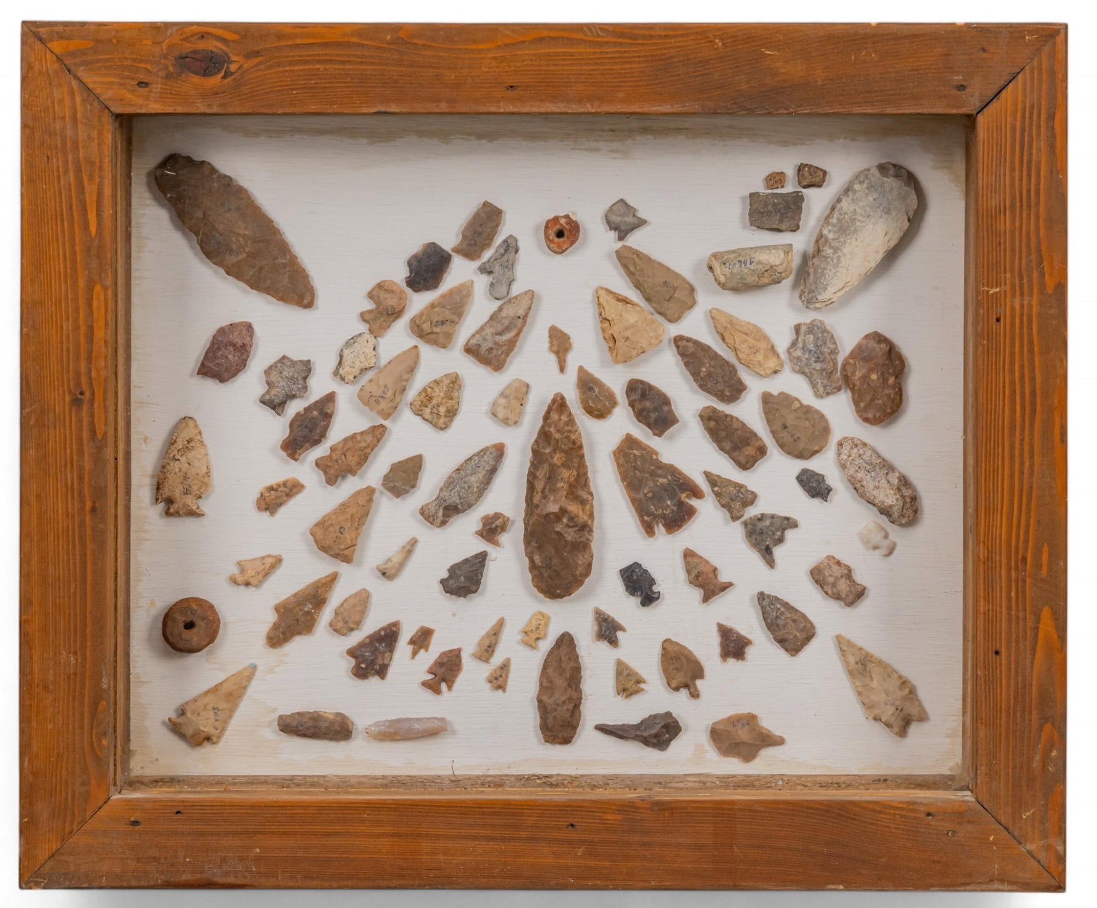 Framed Collection of Projectile Points: Framed collection of projectile points found along the San Antonio river in Southern Bexar County height 19.5 in. x width 23.5 in. x depth 4 in. Provenance: Property from the collection of a San Anton