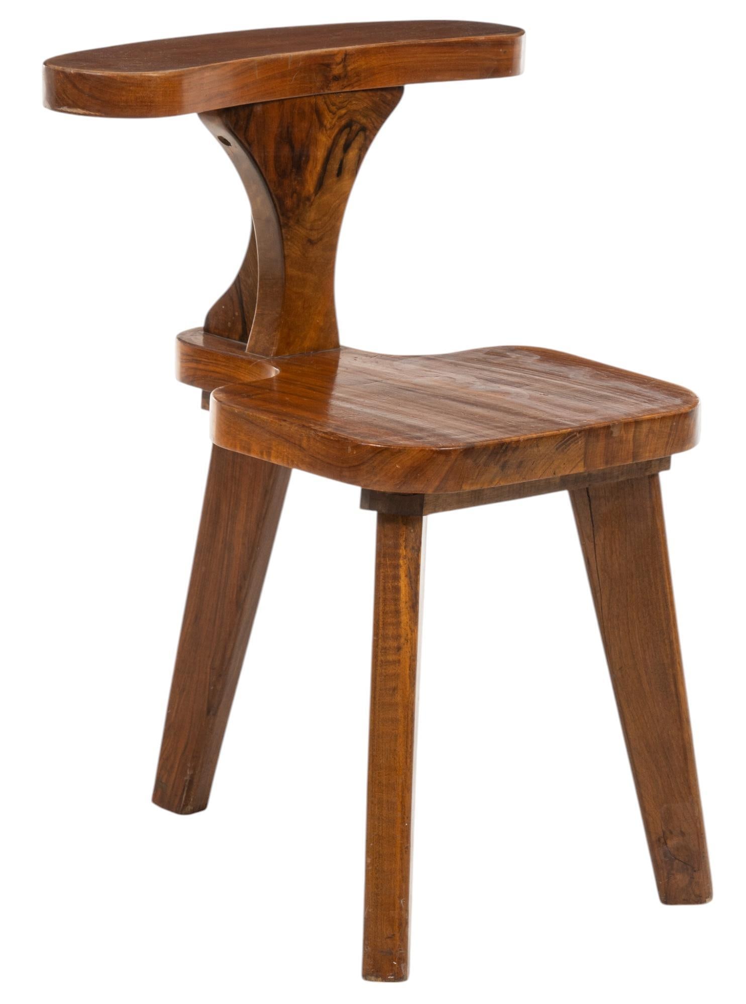 Brutalist Style Tripod Gentleman's Chair: Mid-century brutalist style gentleman's chair, having T-shaped back supported on splayed tripod legs, marked "Fabrication de Meubles, Tabriz, Iran" height 28 in. x width 20.5 in. x depth