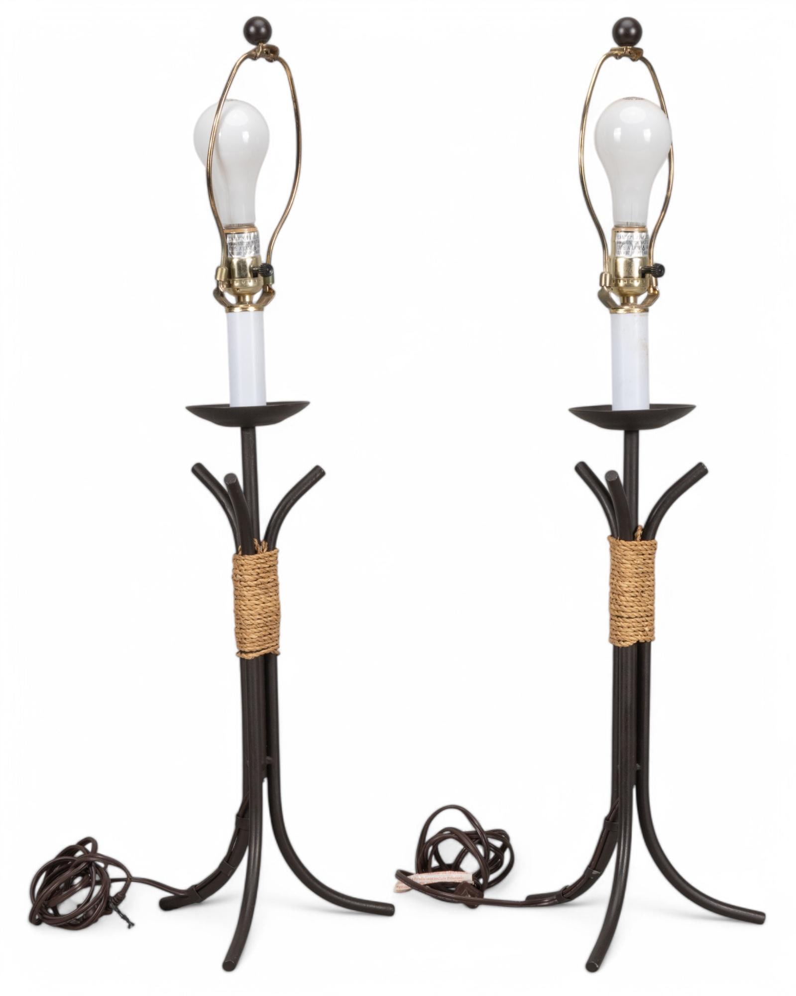 Pair of Metal Table Lamps: Pair of a metal table lamps, with twisted rope accent, without shades height 31.5 in. x width 8.5 in. x depth 8 in. Provenance: The Estate of Urban "Obie" O'Brien III From the Double O Ranch in Paige,