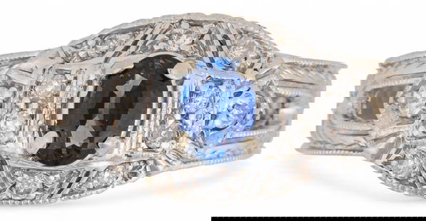 14K White Gold Art Deco Sapphire and Diamond Ring: 14K white gold Art Deco sapphire and diamond ring, featuring central oval sapphire (approx. 7.15 x 5.06 x 3.20 mm) with rows of small inlaid diamonds, size 6.5, marked "14K WB" Total