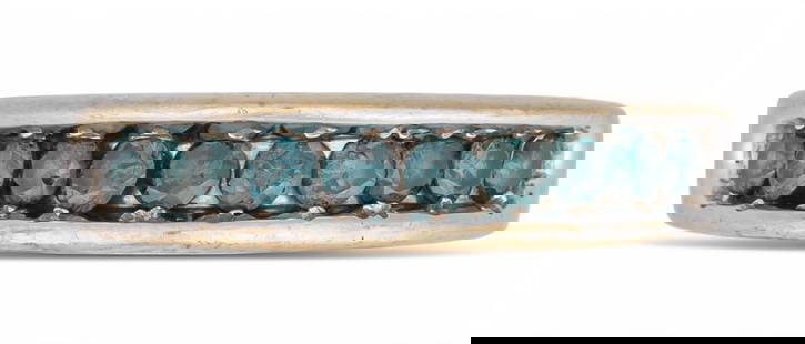 14K White Gold Blue Diamond Band: 14K white gold blue diamond band featuring ten treated blue diamonds, size 6.25, marked "14K" Total weight: 4.7 g All diamond or stone details including but not limited to color,