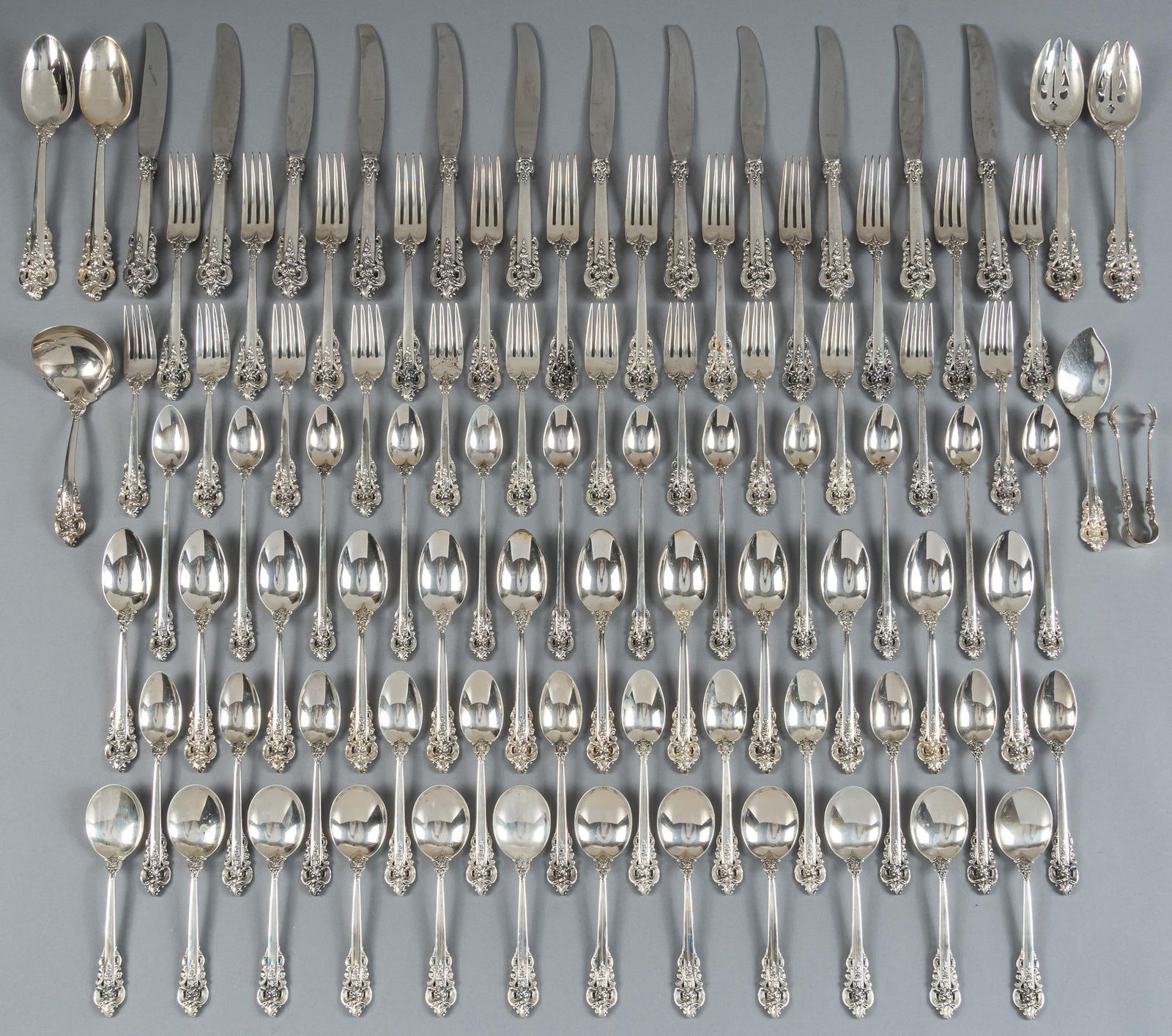 "Grande Baroque" By Wallace Silversmiths Sterling Silver Flatware set: "Grand Baroque" by Wallace Silversmiths sterling silver flatware set of 91 pc, service for 12, no monogram or removal Includes: 12 dinner knives 9 1/8 in. 12 dinner forks 7 7/8 in. 12 salad