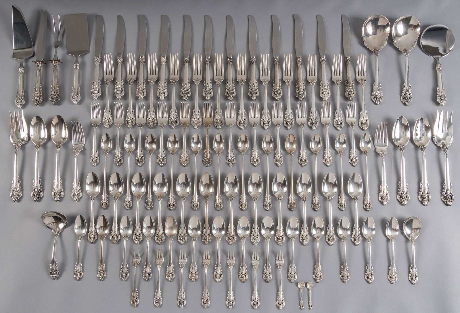 "Grande Baroque" By Wallace Silversmiths Sterling Silver Flatware Set: "Grand Baroque" by Wallace Silversmiths sterling silver flatware set of 218 pc, service for 12, no monogram or removal Includes: 12 dinner knives 9 1/8 in. 12 dinner forks 7 7/8 in. 12 salad