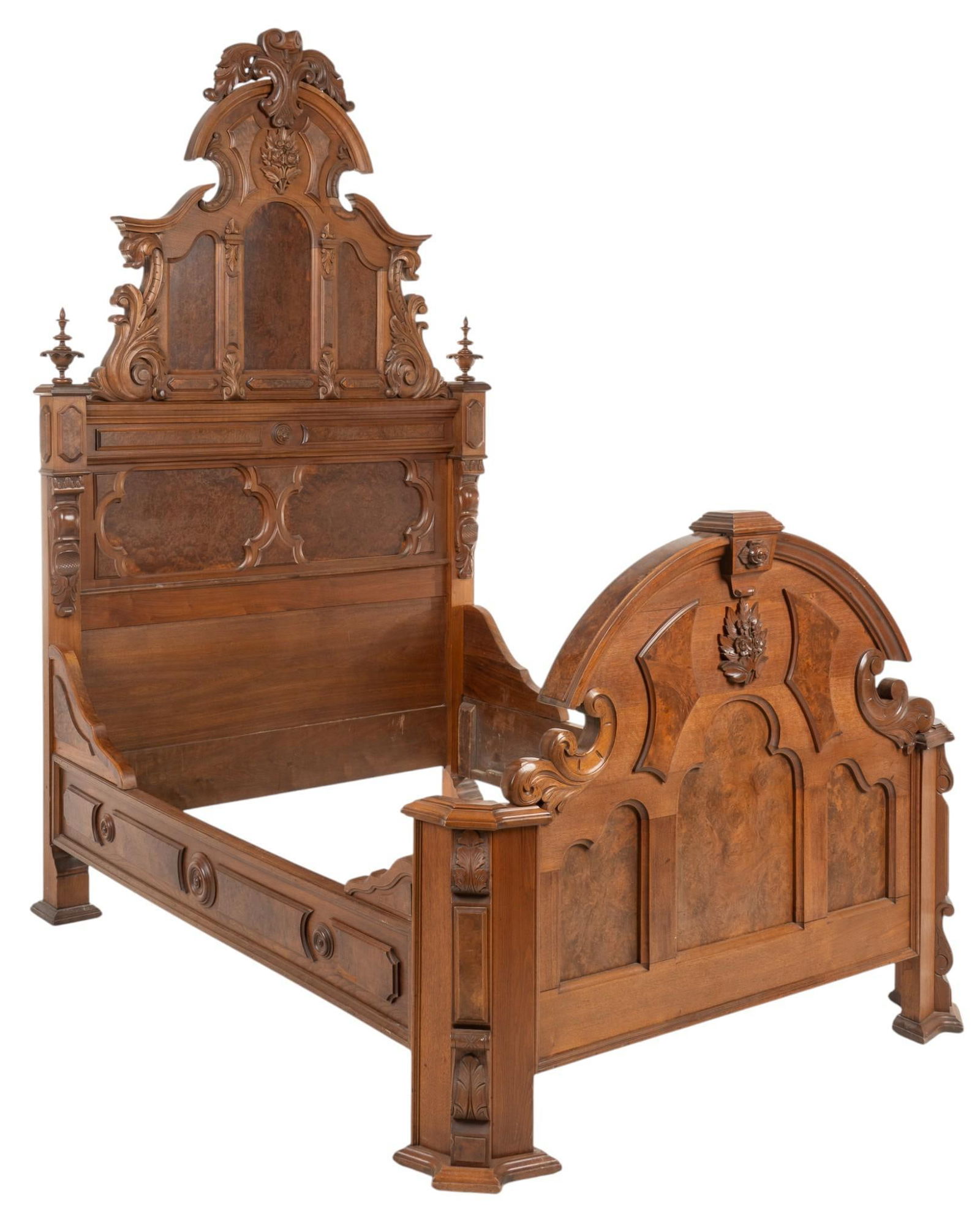 Renaissance Revival Style Bedframe: Renaissance Revival style full-size bed frame, in the style of Thomas Brooks, with orate carvings throughout height 100 in. x width 59 in. x depth 80 in. / exterior width 55 in. x depth 73 in. / inte