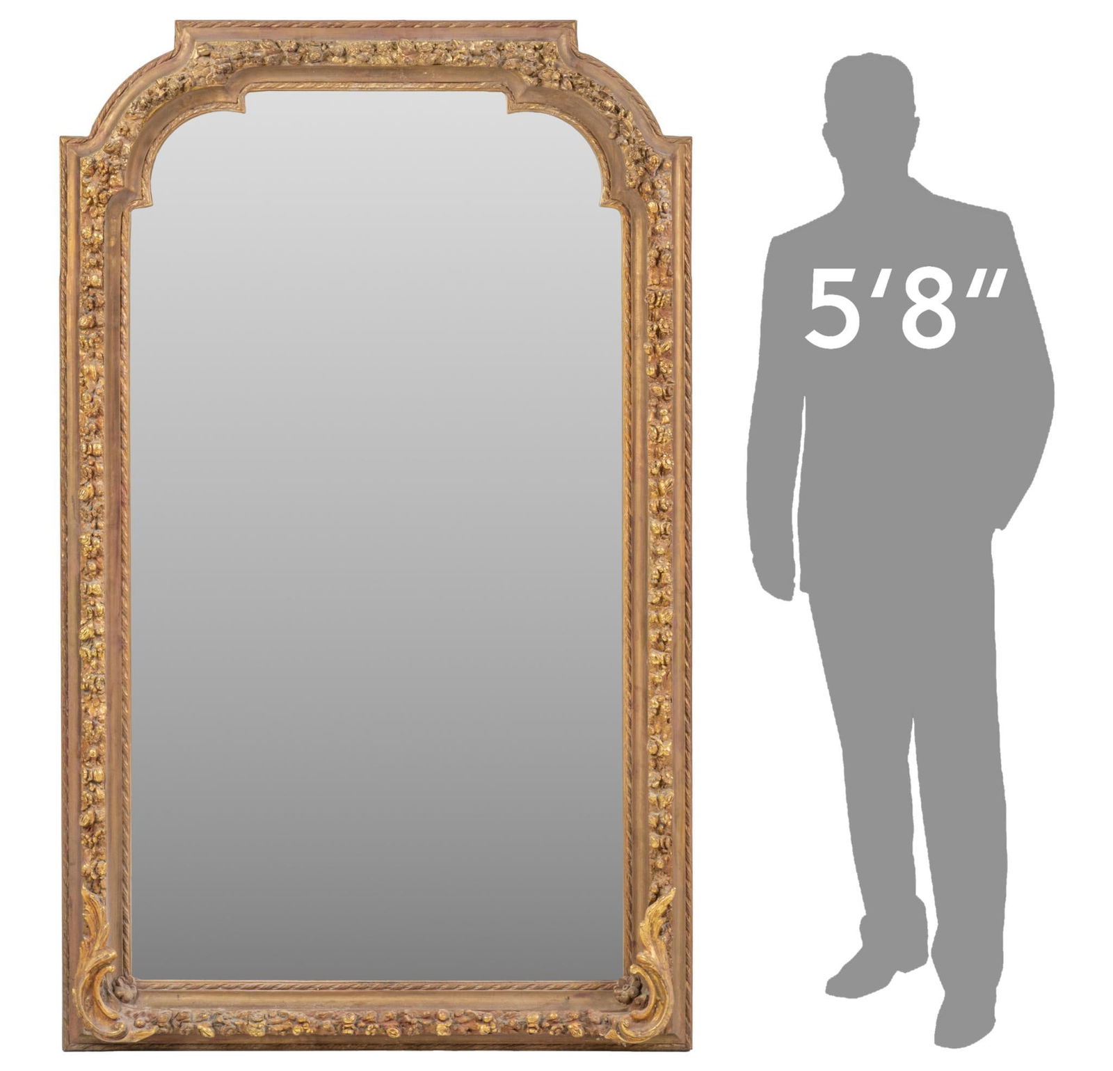 Louis XVI Style Mirror: Five-foot-tall Louis XVI style mirror with ornately carved frame, with gold finish height 71 in. x width 43.5 in. x depth 3 in.