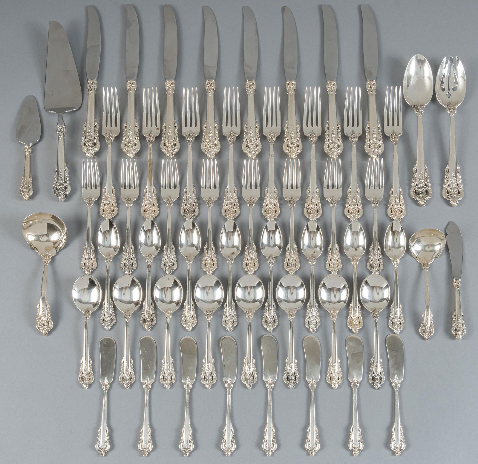 "Grande Baroque" By Wallace Silversmiths Sterling Silver Flatware set: "Grand Baroque" by Wallace Silversmiths sterling silver flatware set of 55 pc, service for 8, no monogram or removal Includes: 8 dinner knives 9 1/8 in. 8 dinner forks 7 7/8 in. 8 salad fork