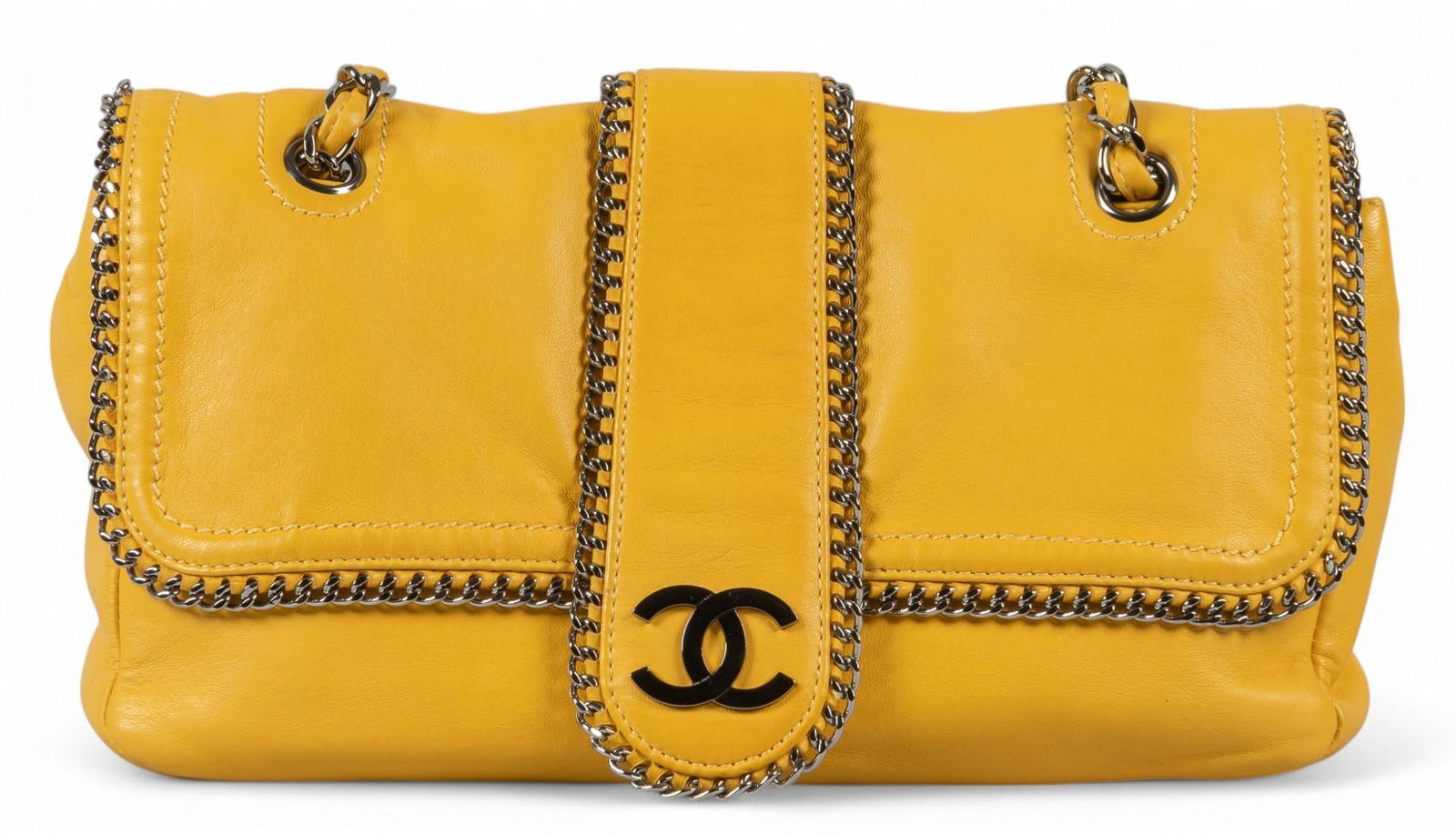 Chanel Madison Shoulder Bag: Chanel Madison shoulder bag of yellow calf leather with yellow lambskin interlaced silver chain, includes dust bag, marked 11403699; third-party authenticated 12 in. x 6.25 in. x 2.25 in. Condition