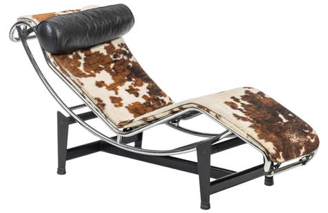 After Le Corbusier Chaise Lounge Chair: Mid-century lounge chair, chrome frame with cowhide upholstery, and black leather pillow, supported on black metal base, after an original 1928 design by Charles-Édouard Jeanneret (Swit., 1887-1965),
