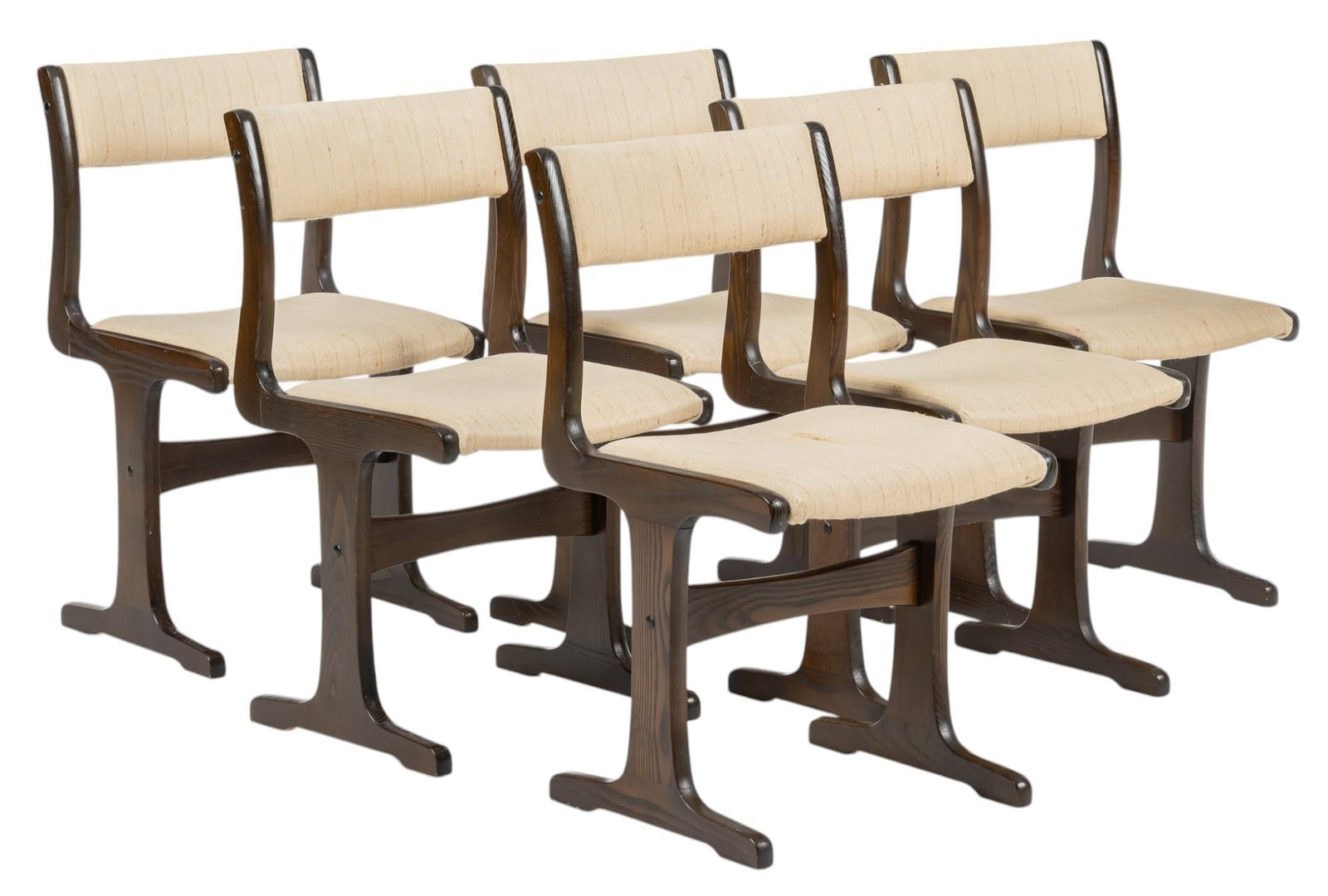 Set of (6) Danish Mid-Century Dining Chairs: Set of six Danish mid-century chairs with cushioned back and seat clad in light beige upholstery fabric, supported in dark wooden frames with trestle legs height 32 in. x width 18 in. x depth 18 in. /