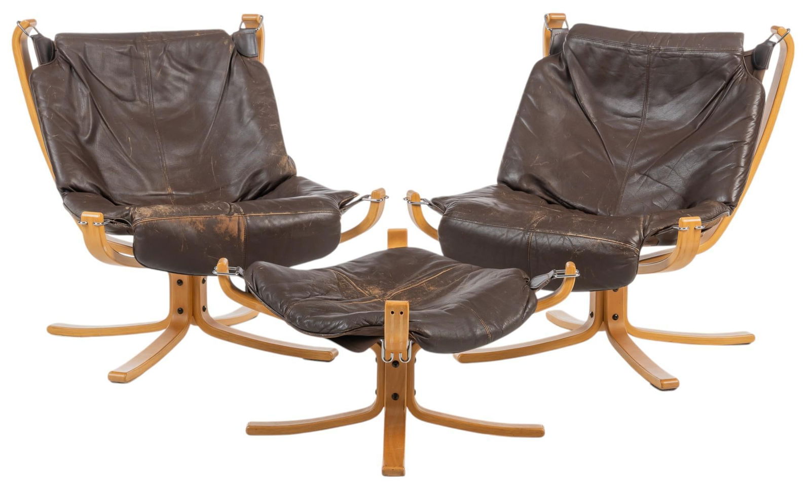 Pair of Danish Mid-Century "Falcon" Chairs: Pair of Danish mid-century "Falcon" chairs, designed by Sigurd Ressell (NOR), brown leather tufted upholstery, bentwood legs, suspension style seat, with matching ottoman height 32 in. x widt