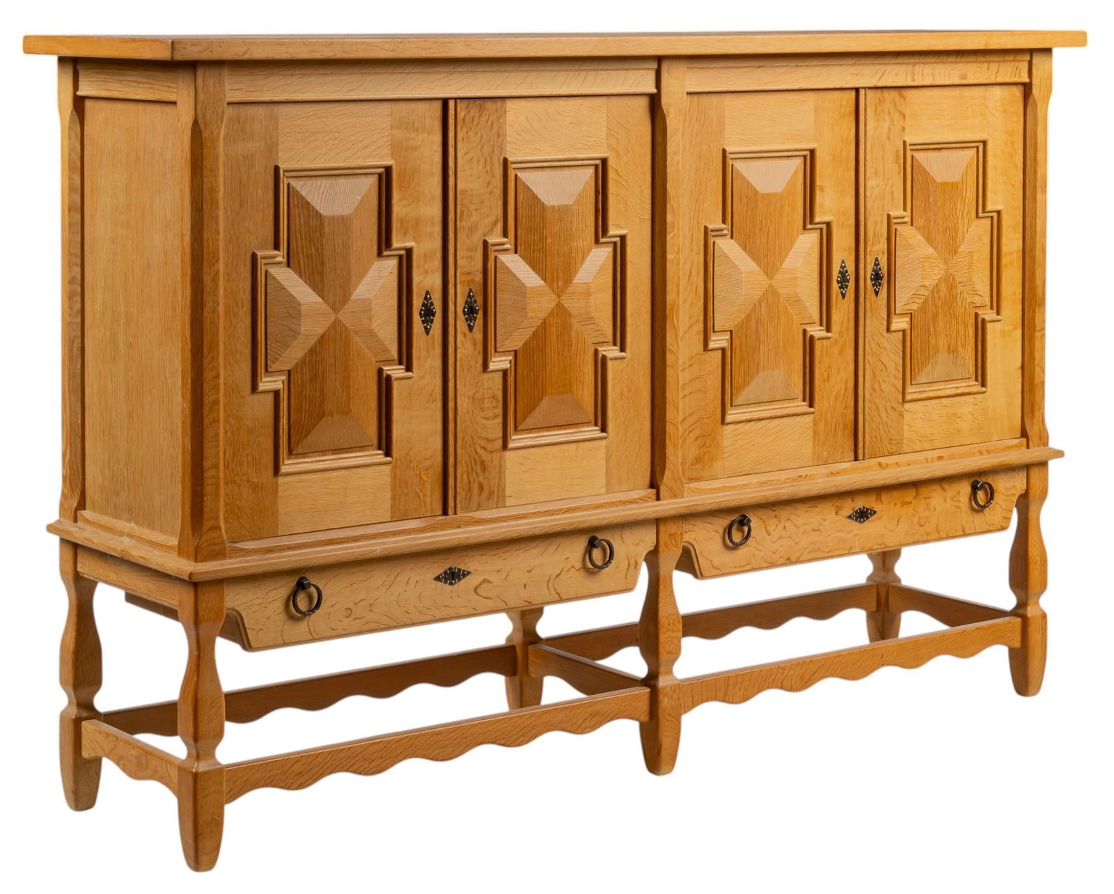 Henning Kjaernulf (DNK) Mid-Century Credenza: Henning Kjaernulf (Denmark) mid-century oak credenza with pair of left-side doors that open to interior with two shelves, and four trays, and pair of right-side doors that open to interior with two sh