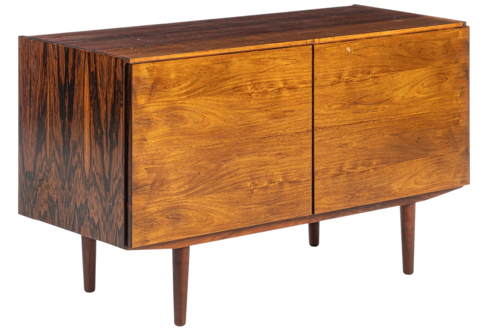 Small Danish Mid-Century Credenza: Small Danish mid-century credenza with pair of doors that open to divided interior with single adjustable shelf on each side, supported on pin legs height 27 in. x width 47 in. x depth 18.5 in. Con