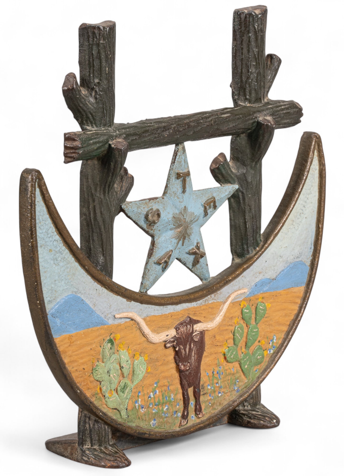 Texas Centennial Cast Iron Doorstop: Texas Centennial painted cast iron doorstop with longhorn steer, cacti, and a star with 'Texas' inscribed, circa 1936 height 10.5 in. x width 10 in. x depth