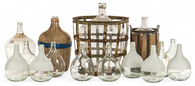Collection of Fifteen Glass Demijohns and Carboys