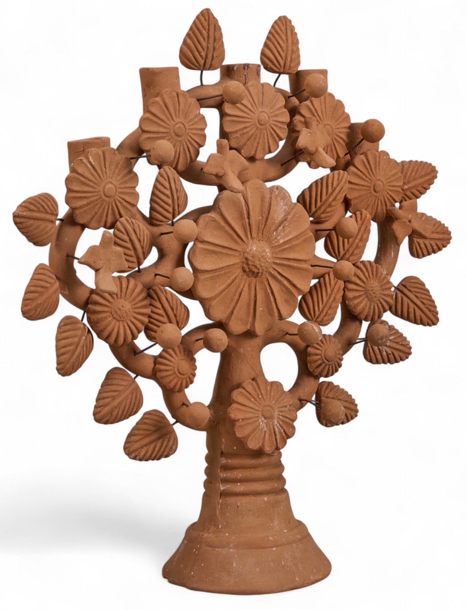 Tree of Life Candelabra: Mexican ceramic tree of life candelabra, unglazed, with floral motif applique height 19.5 in. x width 18.5 in. x depth 5 in. Provenance: Property from a home in San Antonio, Texas