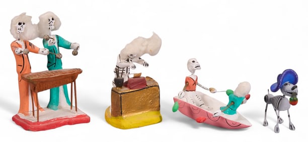 (4) Small Ceramic Skeleton Sculptures