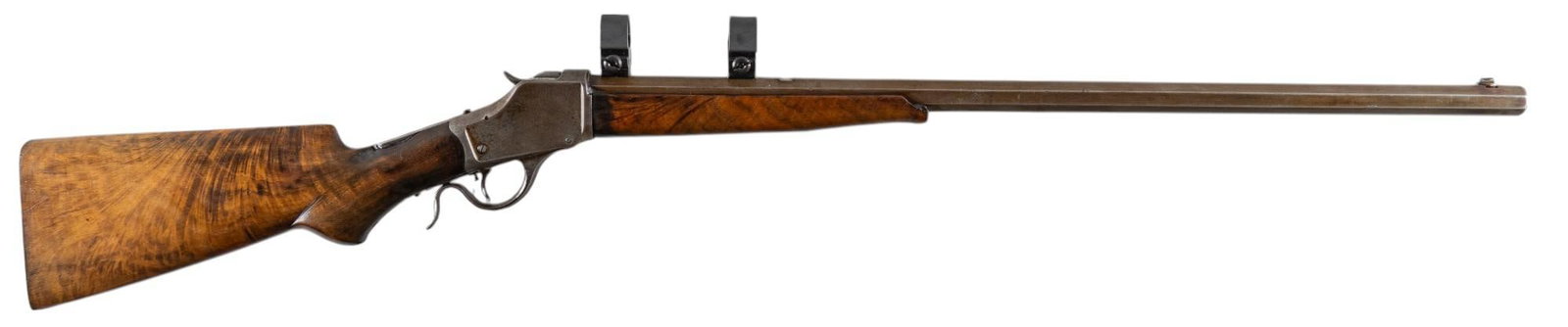 Custom Antique A.W. Peterson Winchester 1885 Low Wall 22 LR Rifle: Serial: 53380 Manufacturer: Winchester (c. 1891) / A.W. Peterson-Denver, Colo. Model: 1885 Low Wall Caliber: 22 LR Barrel length: 28 in. OAL: 43.5 in. Condition: Good; wood stock & forend have mos