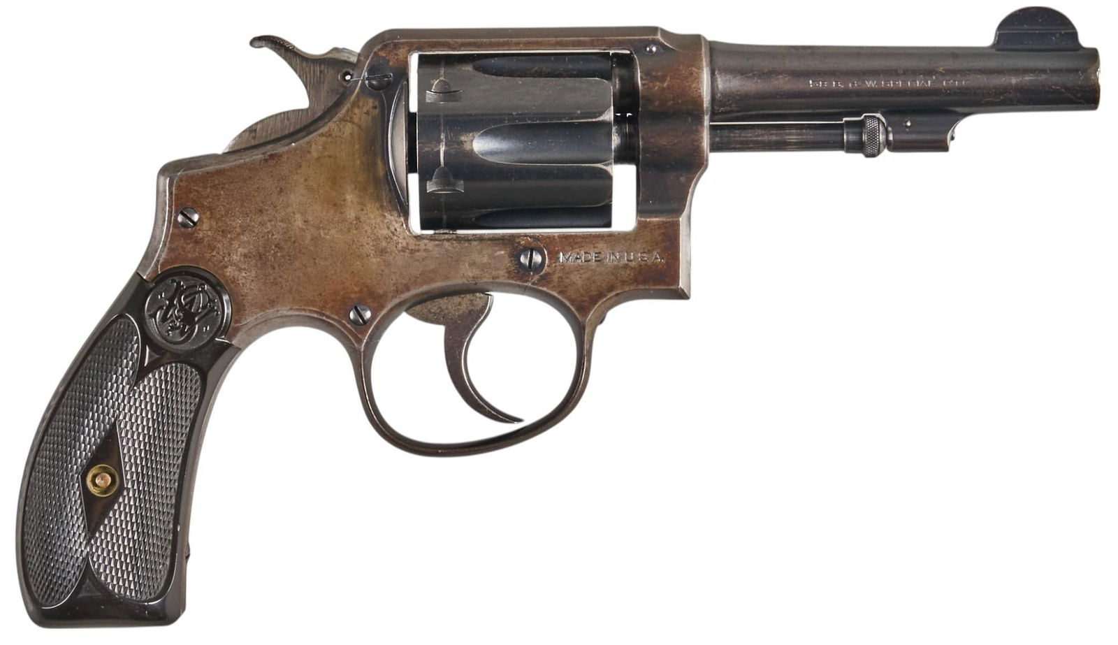 Smith & Wesson M&P Pre-Model 10 38 Spl Revolver: Serial: 468549 Manufacturer: Smith & Wesson Model: M&P Pre-Model 10 Caliber: 38 Spl Barrel length: 4 in. OAL: 9 in. Condition: Fair; hard rubber grips have mostly light handling marks w/ 1 chi