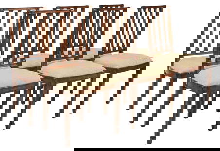 Set of (6) Upholstered Dining Chairs: Set of six wooden dining chairs, with slat backs, carved details throughout, textured white upholstery seats, on carved and tapered block legs height 39 in. x width 20 in. x depth 18 in. / each