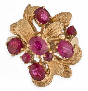 14K Ruby Ring: 14K gold ruby floral ring featuring inlaid rubies in floral arrangement, size 6, marked "14K"Total weight: 5.6 g 
