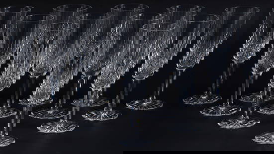 (12) Waterford Crystal "Lismore" Champagne Flutes: Set of twelve&nbsp;crystal champagne flutes by Waterford, in the &quot;Lismore&quot; pattern, marked on base height 7.5 in. x diameter 2.75 in. / each Provenance: Property from the Hill Country Villag