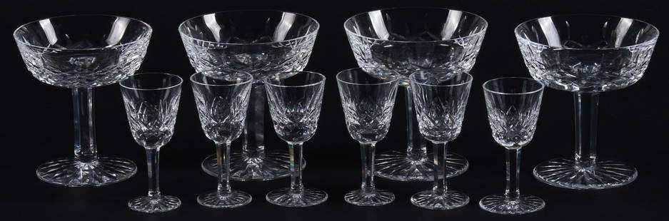 (10) Waterford Crystal 'Lismore' Stemware: Collection of ten crystal stemware by Waterford, in the &quot;Lismore&quot; pattern, with six claret glasses and four champagne / sherbert glasses, marked on base height 4.25 in. x diameter 4 in. / la