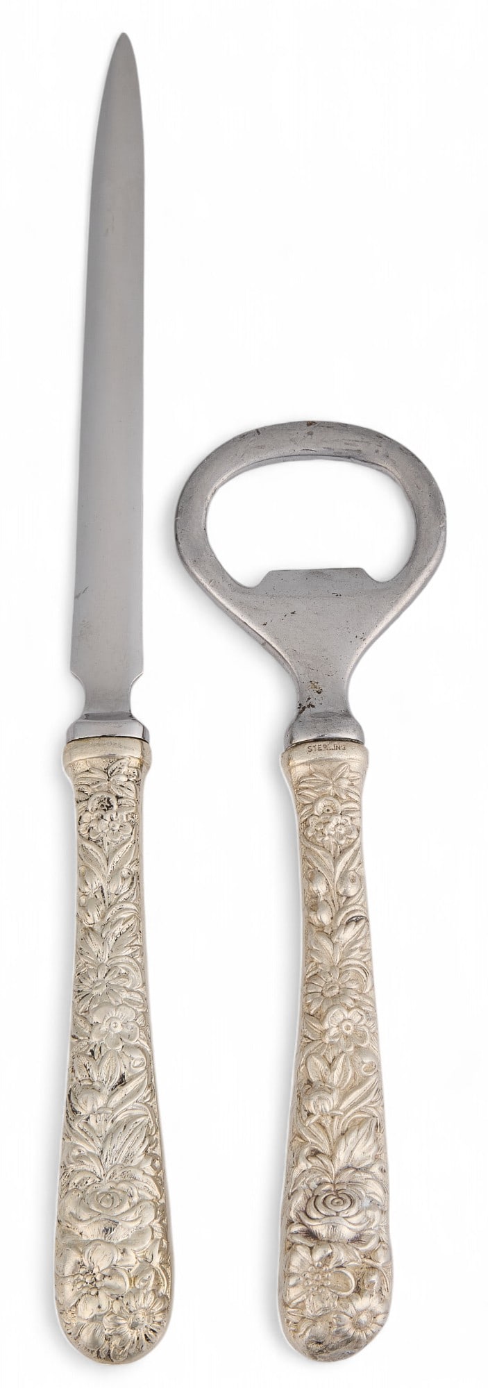 "Repousse" by Kirk & Son Sterling Silver Letter Opener & Bottle Opener: "Repousse" by Kirk & Son sterling silver letter opener and bottle opener, marked "Sterling Kirk & Son" Total weight: 1.50 ozt Provenance: Property from the collection of a