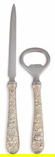 "Repousse" by Kirk & Son Sterling Silver Letter Opener & Bottle Opener: &quot;Repousse&quot; by Kirk &amp; Son sterling silver letter opener and bottle opener, marked &quot;Sterling Kirk &amp; Son&quot; Total weight: 1.50 ozt Provenance: Property from the collection of a