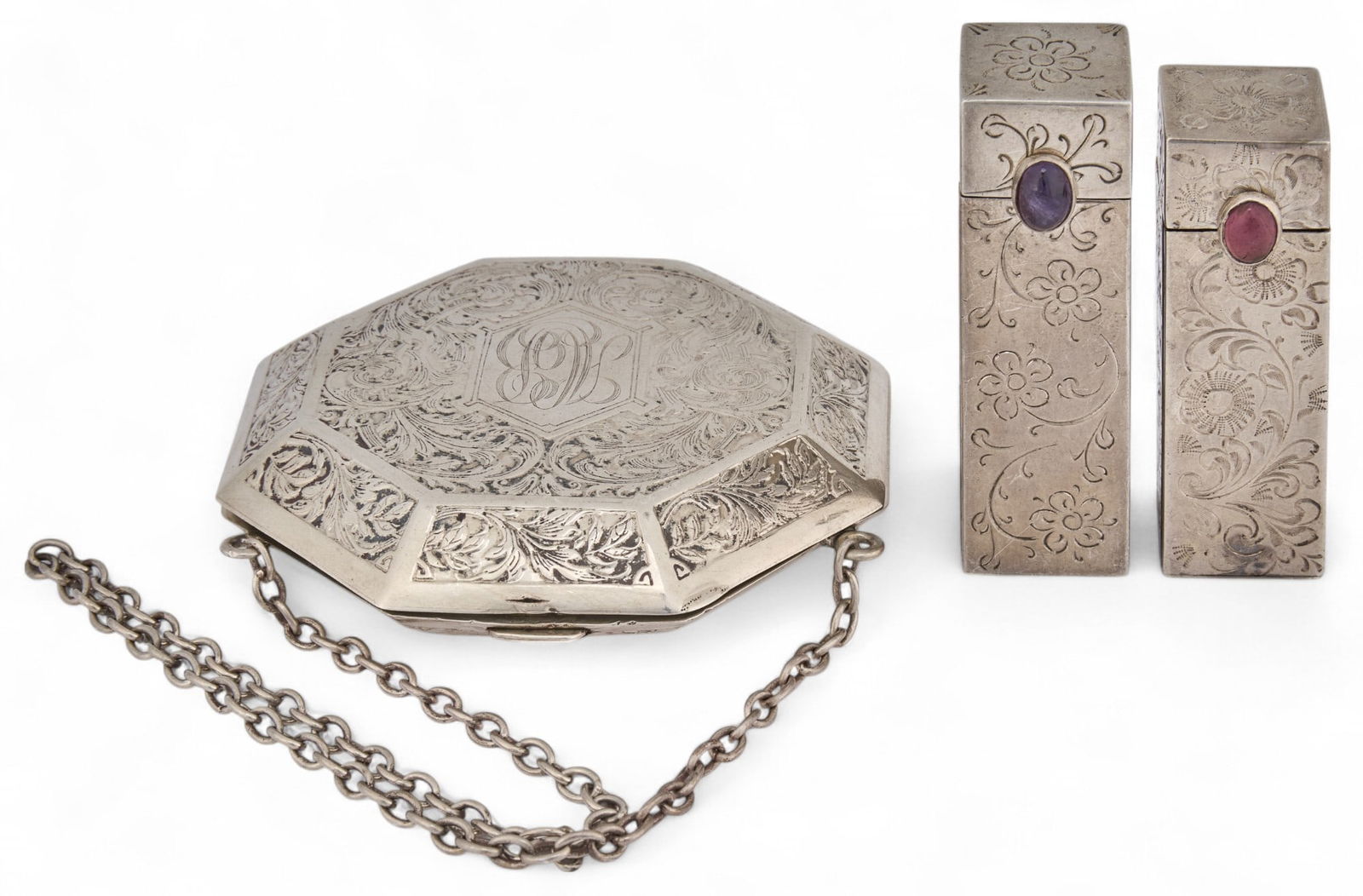 (3) .800 Fine Makeup Compacts: Three .800 fine makeup compacts including one blush compact with mirror and two lipstick cases, marked "800" Total weight: 1.00 ozt Provenance: Property from the collection of a San Ant