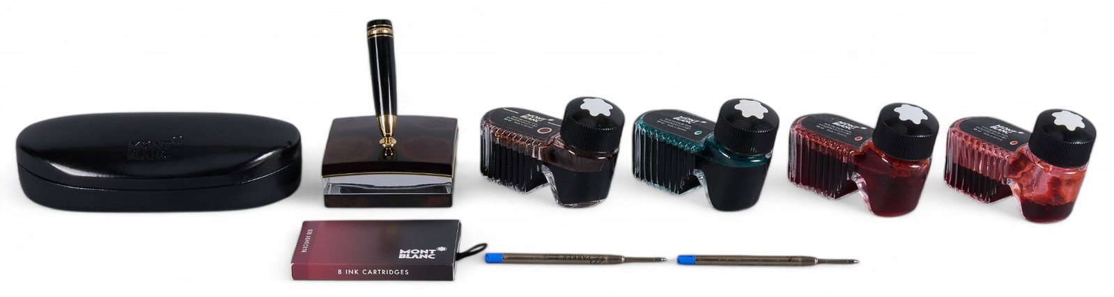 Collection of Montblanc Accessories: Collection of Mont Blanc accessories including case, ink and cartridges and fountain pen holder Provenance: Property from the collection of a San Antonio, Texas oil and gas entrepreneur
