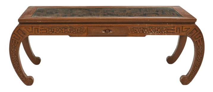 Asian Carved Wood Coffee Table with Glass Top: Carved wooden coffee table with single drawer, glass top, and intricately carved scene blow height 17.5 in. x width 48 in. x depth 20 in. Provenance: Property from the trophy room of a ranch near