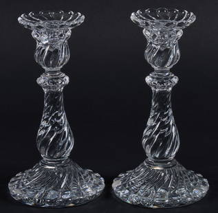 Pair Of Baccarat Bambous Swirl Candlesticks: Pair of Baccarat crystal candlesticks in Bambous Swirl pattern, marked on buttom height 9 in. x diameter 4 in. / each Provenance: Property from The Cellars at The Pearl apartment of late anesthesiolog