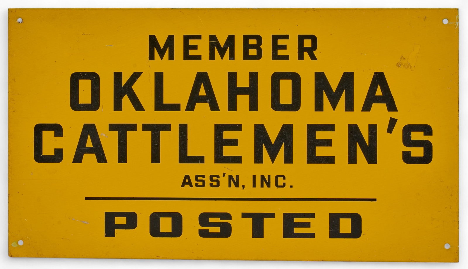 Oklahoma Cattlemen's Sign: Vintage sign for Oklahoma Cattleman's Association members, single sided, metal, with black lettering on yellow field height 10 in. x width 18 in. Property from the personal collection of a New Bra