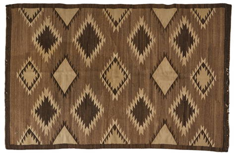 Geometric Navajo Style Rug, 5 ft. 3 in. x 3 ft 8 in.: Navajo style rug with brown and beige geometric pattern 5 ft. 3 in. x 3 ft 8 in.&nbsp; Provenance: Property from a home in San Antonio, Texas