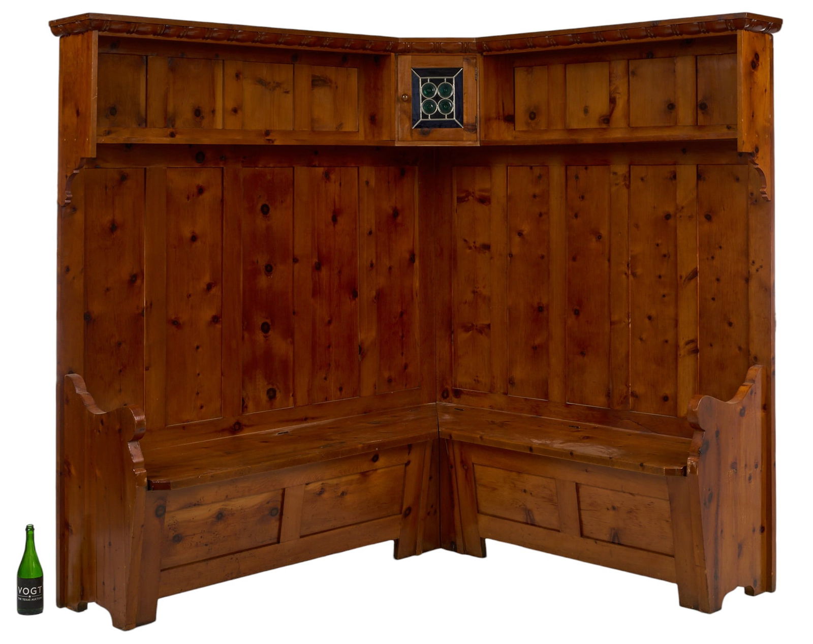 Banquette Booth: Banquette booth with small stained glass door, open shelves, and bench seeting height 77 in. x width (longest side) 71 in. x depth 60 in. 