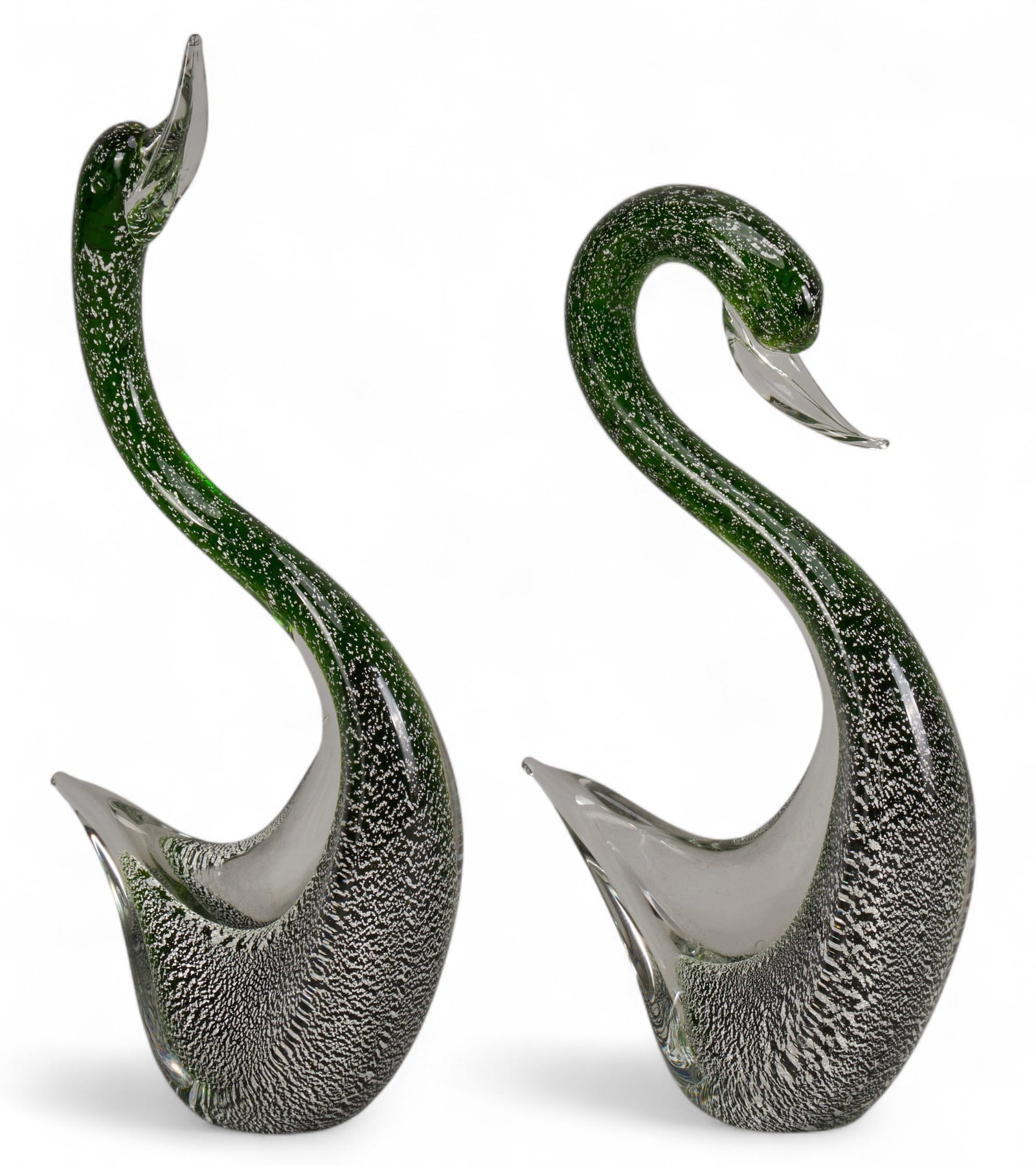 Pair of Art Glass Swans: Pair of art glass swans, one with bowing neck height 14 in. x width 2.5 in. x depth 6.5 in. / largest Provenance: Property from a San Antonio, Texas antiques collector