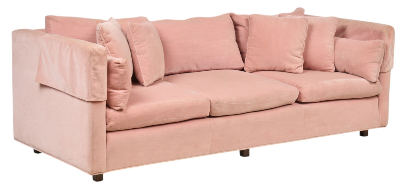 Pink Velvet Mid-Century Sofa: Mid-century sofa with pink velvet upholstery, down cushions, and armrest covers height 27 in. x width 81 in. x depth 35 in. Provenance: Property from a Universal City, Texas Condition